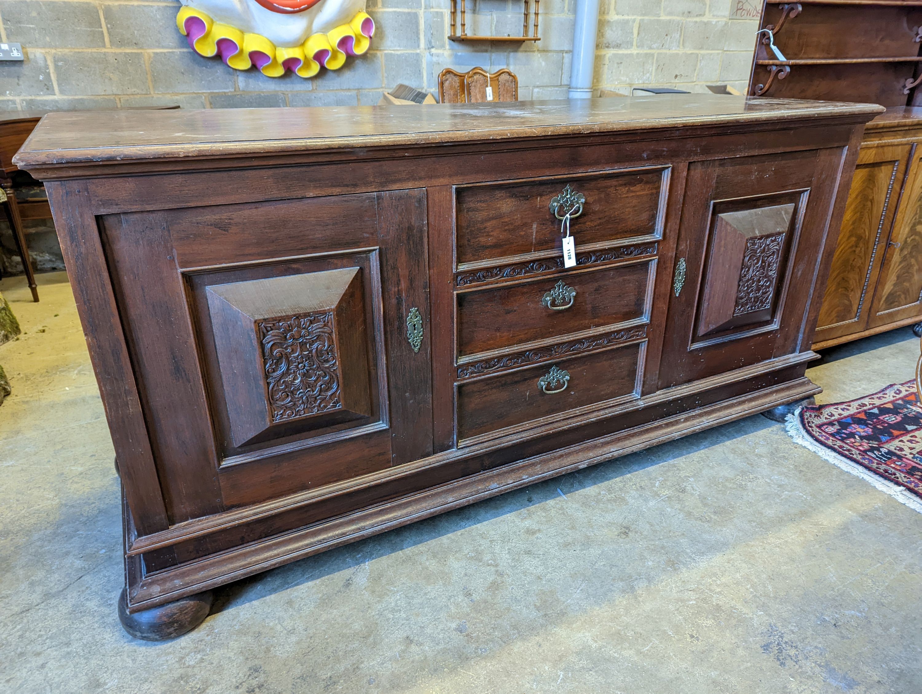 A 19th century Dutch oak buffet, width 210cm, depth 70cm, height 102cm